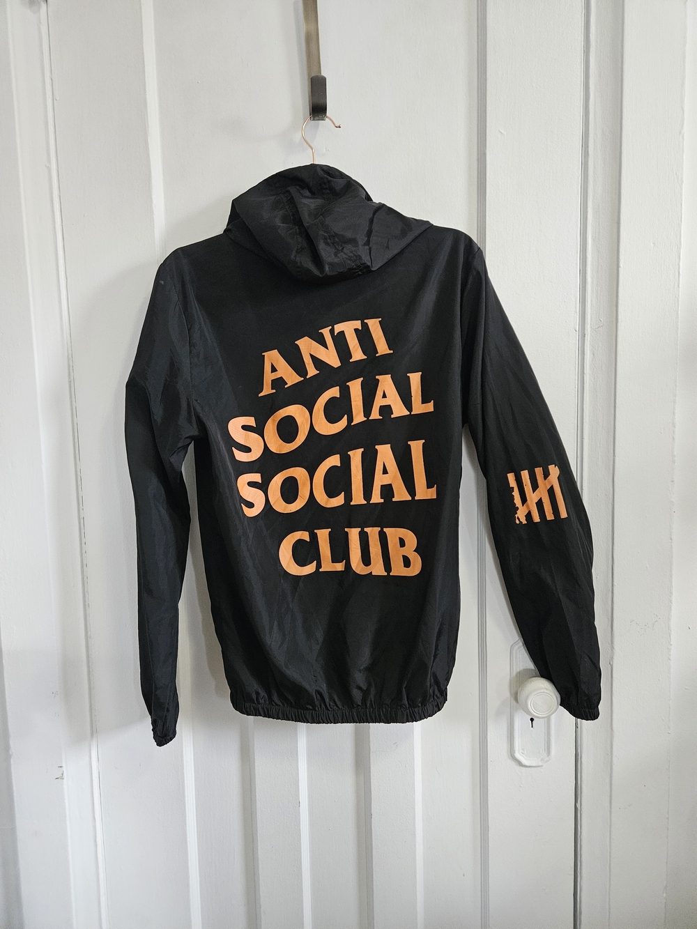 Anti Social Social Club Black Windbreaker with Orange Graphic